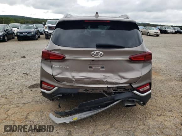 2019 Hyundai Santa Fe SEL Plus с VIN 5NMS33AD0KH015863, выставлен на аукционе Copart как лот 69915485 с пробегом 70 733 миль миль и Списание • Salvage title. История ставок и продаж доступна на DreamBid. Изображение 6.