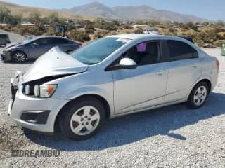 2015 Chevrolet Sonic LS with VIN 1G1JB5SH2F4126482, listed as a Copart auction lot 70247754 with 99,090 mi miles and Salvage title. Bid and sale history available at DreamBid. Image 1.