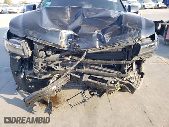 2024 Cadillac Escalade with VIN 1GYS4PKT3RR207675, listed as a Copart auction lot 77889674 with 34,951 mi miles and Salvage title. Bid and sale history available at DreamBid. Image 12.