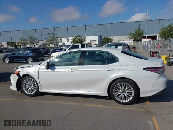 2020 Toyota Camry Hybrid XLE with VIN 4T1F31AK4LU523702, listed as a IAAI auction lot 42734831 with 144,778 mi miles and . Bid and sale history available at DreamBid. Image 14.