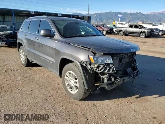 2019 Jeep Grand Cherokee Laredo E with VIN 1C4RJEAG2KC816707, listed as a Copart auction lot 84885965 with 76,380 mi miles and Salvage title. Bid and sale history available at DreamBid. Image 14.