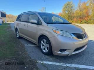 2012 Toyota Sienna LE AAS with VIN 5TDKK3DC9CS233451, listed as a Copart auction lot 87127545 with 220,725 mi miles and Clean title. Bid and sale history available at DreamBid. Image 1.