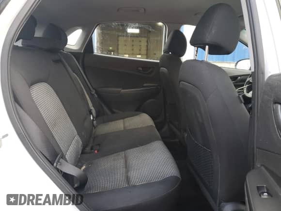 2020 Hyundai Kona SEL z VIN KM8K22AA4LU410587, wystawiony jako Copart lot #90244215 z przebiegiem 122 287 mil mil oraz Czysty tytuł • Clean title. Historia ofert i sprzedaży dostępna na DreamBid. Obrazek 11.