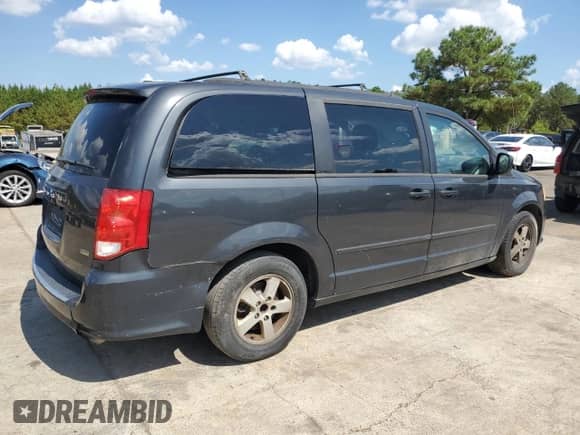 2012 Dodge Grand Caravan SXT with VIN 2C4RDGCG2CR264666, listed as a Copart auction lot 81803935 with 204,945 mi miles and Clean title. Bid and sale history available at DreamBid. Image 3.
