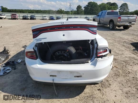 2021 Dodge Charger Police с VIN 2C3CDXKG2MH579938, выставлен на аукционе Copart как лот 60264975 с пробегом Не указан миль и Списание • Salvage title. История ставок и продаж доступна на DreamBid. Изображение 6.
