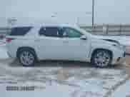 2021 Chevrolet Traverse High Country with VIN 1GNEVNKW8MJ203490, listed as a IAAI auction lot 41252324 with 70,466 mi miles and . Bid and sale history available at DreamBid. Image 13.