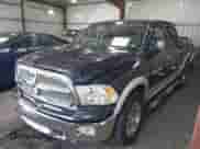 2012 Ram 1500 Laramie with VIN 1C6RD7NT5CS229782, listed as a IAAI auction lot 42908881 with 145,444 mi miles and . Bid and sale history available at DreamBid. Image 2.