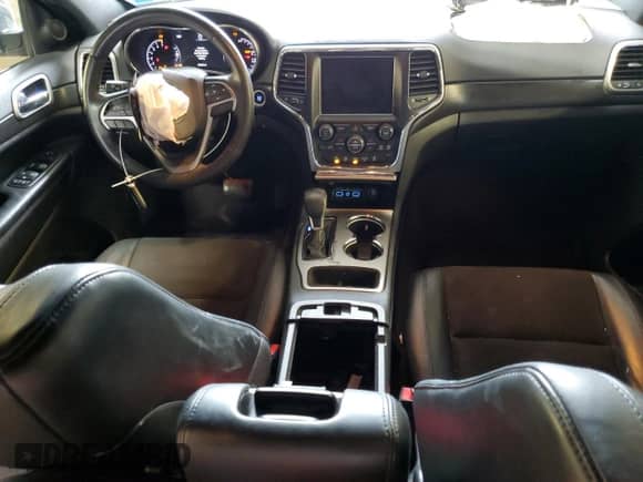 2018 Jeep Grand Cherokee Laredo with VIN 1C4RJFAGXJC487078, listed as a Copart auction lot 63752115 with 69,126 mi miles and Salvage title. Bid and sale history available at DreamBid. Image 8.