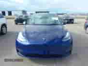 2021 Tesla Model Y Long Range with VIN 5YJYGDEE8MF187196, listed as a IAAI auction lot 42615790 with 89,810 mi miles and . Bid and sale history available at DreamBid. Image 11.