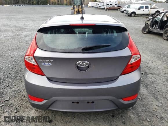2014 Hyundai Accent GS z VIN KMHCT5AE6EU177501, wystawiony jako Copart lot #84921615 z przebiegiem 65 930 mil mil oraz Szkoda całkowita • Salvage title. Historia ofert i sprzedaży dostępna na DreamBid. Obrazek 6.