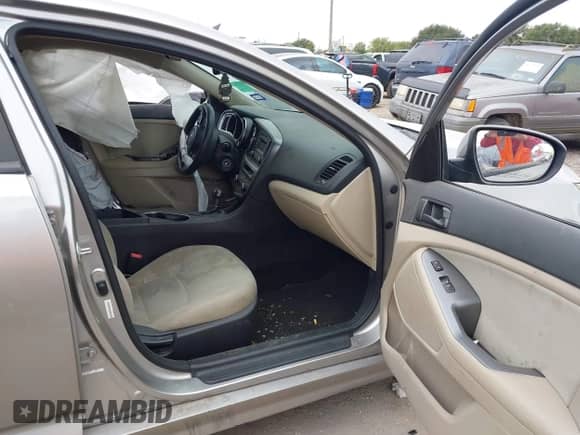 2014 Kia Optima LX with VIN 5XXGM4A73EG351335, listed as a IAAI auction lot 43287799 with 176,349 mi miles and . Bid and sale history available at DreamBid. Image 5.