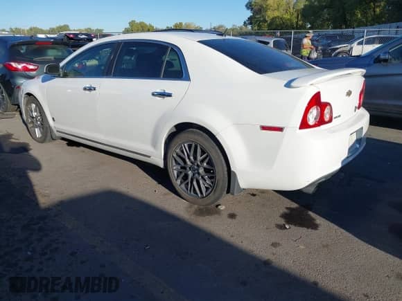 2009 Chevrolet Malibu LTZ with VIN 1G1ZK57749F131338, listed as a IAAI auction lot 43411871 with 135,544 mi miles and . Bid and sale history available at DreamBid. Image 3.