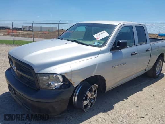 2012 Ram 1500 Tradesman z VIN 1C6RD6FP2CS168791, wystawiony jako IAAI lot #41644108 z przebiegiem 211 029 mil mil oraz . Historia ofert i sprzedaży dostępna na DreamBid. Obrazek 6.