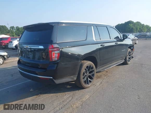 2023 Chevrolet Suburban LT with VIN 1GNSKCKD4PR250410, listed as a IAAI auction lot 42404471 with 71,552 mi miles and . Bid and sale history available at DreamBid. Image 4.