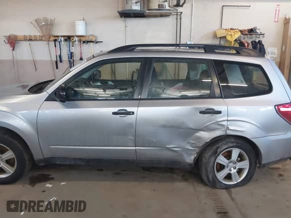 2013 Subaru Forester X z VIN JF2SHABC6DG424991, wystawiony jako IAAI lot #41638591 z przebiegiem 152 047 mil mil oraz . Historia ofert i sprzedaży dostępna na DreamBid. Obrazek 14.