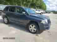 2007 Jeep Compass Sport with VIN 1J8FT47W47D221924, listed as a Copart auction lot 56949875 with 193,909 mi miles and Clean title. Bid and sale history available at DreamBid. Image 4.