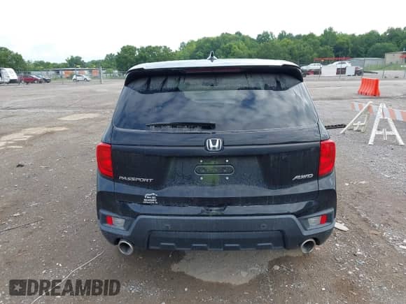 2023 Honda Passport EX-L with VIN 5FNYF8H56PB020149, listed as a IAAI auction lot 42777091 with 39,419 mi miles and . Bid and sale history available at DreamBid. Image 16.