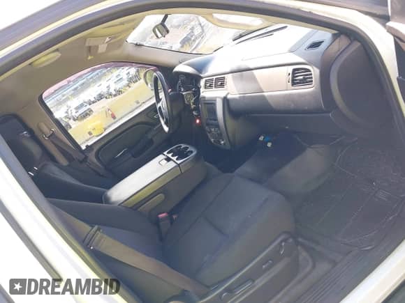 2013 Chevrolet Tahoe Commercial with VIN 1GNLC2E00DR123783, listed as a IAAI auction lot 43216930 with 187,787 mi miles and . Bid and sale history available at DreamBid. Image 5.