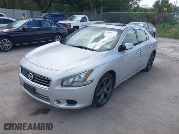 2014 Nissan Maxima S z VIN 1N4AA5APXEC444170, wystawiony jako IAAI lot #43251311 z przebiegiem 243 605 mil mil oraz . Historia ofert i sprzedaży dostępna na DreamBid. Obrazek 17.