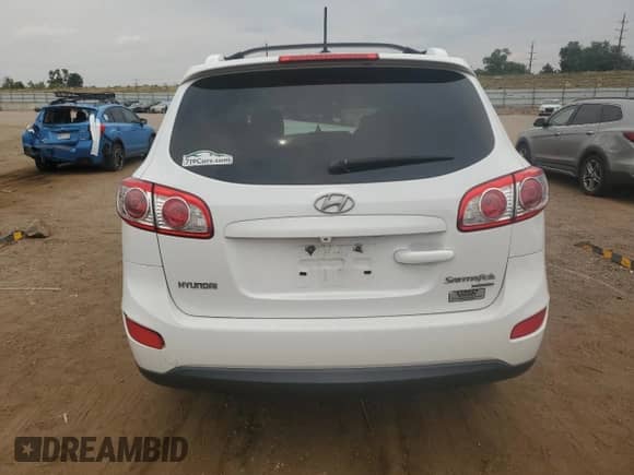 2011 Hyundai Santa Fe SE с VIN 5XYZHDAG2BG063651, выставлен на аукционе Copart как лот 69108095 с пробегом Не указан миль и Списание • Salvage title. История ставок и продаж доступна на DreamBid. Изображение 6.