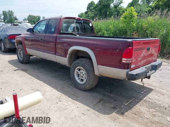 2000 Dodge Dakota Sport with VIN 1B7GG22N4YS732002, listed as a IAAI auction lot 42389415 with 138,944 mi miles and . Bid and sale history available at DreamBid. Image 3.
