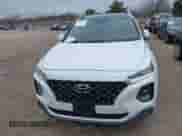 2019 Hyundai Santa Fe Ultimate с VIN 5NMS5CAAXKH131278, выставлен на аукционе IAAI как лот 41860473 с пробегом 106 654 миль миль и . История ставок и продаж доступна на DreamBid. Изображение 13.