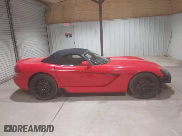 2003 Dodge Viper SRT-10 с VIN 1B3JR65ZX3V501667, выставлен на аукционе IAAI как лот 42926637 с пробегом 26 405 миль миль и . История ставок и продаж доступна на DreamBid. Изображение 13.