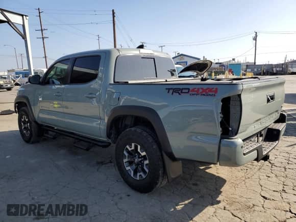 2022 Toyota Tacoma TRD Off Road с VIN 3TMCZ5AN6NM494685, выставлен на аукционе Copart как лот 82319385 с пробегом 42 267 миль миль и Списание • Salvage title. История ставок и продаж доступна на DreamBid. Изображение 2.
