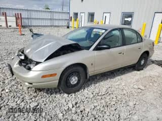 2001 Saturn SL with VIN 1G8ZK52741Z200069, listed as a Copart auction lot 56360685 with 115,673 mi miles and Non repairable. Bid and sale history available at DreamBid. Image 1.