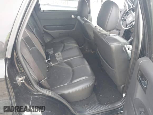 2008 Mercury Mariner with VIN 4M2CU91108KJ51427, listed as a IAAI auction lot 43339990 with 227,044 mi miles and . Bid and sale history available at DreamBid. Image 8.