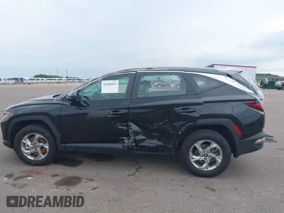 2023 Hyundai Tucson SE with VIN 5NMJACAE9PH183812, listed as a IAAI auction lot 43050593 with 18,512 mi miles and . Bid and sale history available at DreamBid. Image 14.
