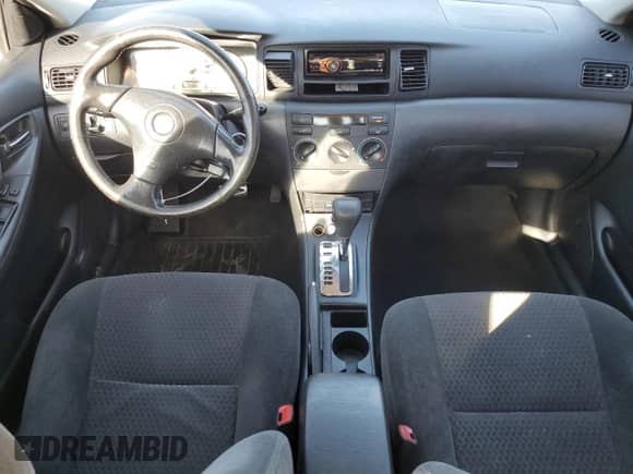 2006 Toyota Corolla LE z VIN 2T1BR32E36C651405, wystawiony jako Copart lot #86634515 z przebiegiem 226 878 mil mil oraz Szkoda całkowita • Salvage title. Historia ofert i sprzedaży dostępna na DreamBid. Obrazek 8.