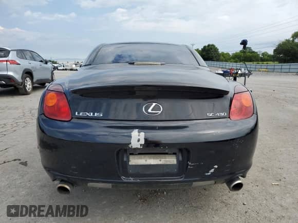 2004 Lexus SC 430 z VIN JTHFN48Y140057860, wystawiony jako Copart lot #68478855 z przebiegiem 276 632 mil mil oraz Szkoda całkowita • Salvage title. Historia ofert i sprzedaży dostępna na DreamBid. Obrazek 6.