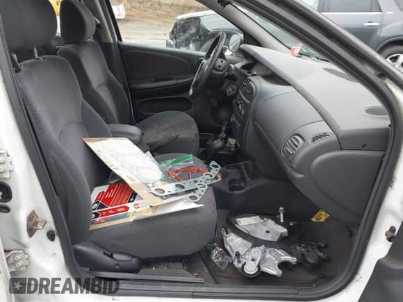 2000 Dodge Neon Highline z VIN 1B3ES46C5YD873452, wystawiony jako IAAI lot #41513250 z przebiegiem 187 868 mil mil oraz . Historia ofert i sprzedaży dostępna na DreamBid. Obrazek 5.