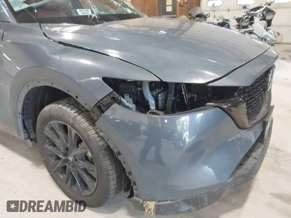 2024 Mazda CX-5 S Preferred z VIN JM3KFBCM0R0398834, wystawiony jako IAAI lot #42841174 z przebiegiem 6 031 mil mil oraz . Historia ofert i sprzedaży dostępna na DreamBid. Obrazek 21.