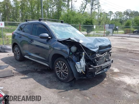 2019 Hyundai Tucson Sport z VIN KM8J33AL3KU937888, wystawiony jako IAAI lot #42310448 z przebiegiem 99 501 mil mil oraz . Historia ofert i sprzedaży dostępna na DreamBid. Obrazek 1.