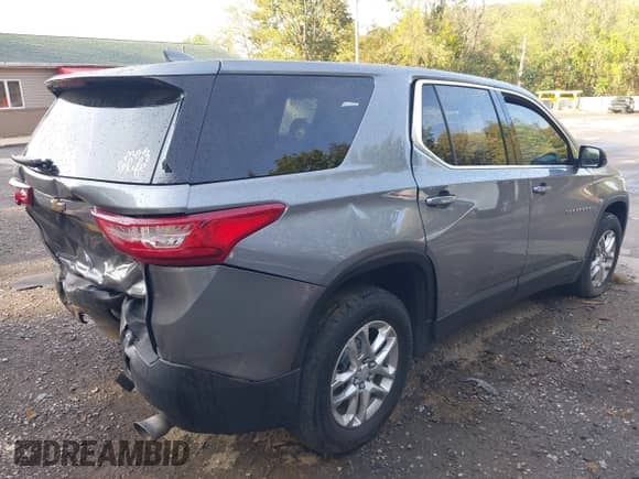 2019 Chevrolet Traverse LS z VIN 1GNERFKW6KJ215239, wystawiony jako IAAI lot #43262435 z przebiegiem 91 631 mil mil oraz . Historia ofert i sprzedaży dostępna na DreamBid. Obrazek 4.