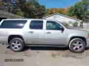 2009 Chevrolet Suburban LTZ z VIN 1GNFK363X9R189568, wystawiony jako IAAI lot #43251361 z przebiegiem 214 783 mil mil oraz . Historia ofert i sprzedaży dostępna na DreamBid. Obrazek 14.