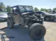 2001 Jeep Wrangler Sahara z VIN 1J4FA59S61P352141, wystawiony jako Copart lot #66212355 z przebiegiem Nie podano mil oraz Czysty tytuł • Clean title. Historia ofert i sprzedaży dostępna na DreamBid. Obrazek 4.