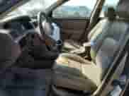 1999 Toyota Camry LE с VIN 4T1BG28K4XU604560, выставлен на аукционе Copart как лот 67268415 с пробегом 297 566 миль миль и Списание • Salvage title. История ставок и продаж доступна на DreamBid. Изображение 7.