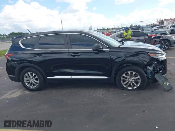 2020 Hyundai Santa Fe SE with VIN 5NMS23AD2LH160052, listed as a IAAI auction lot 43356238 with 90,990 mi miles and . Bid and sale history available at DreamBid. Image 13.