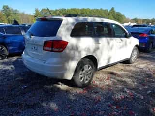 2014 Dodge Journey SE with VIN 3C4PDDAG9ET282199, listed as a IAAI auction lot 43430504 with 97,421 mi miles and . Bid and sale history available at DreamBid. Image 4.