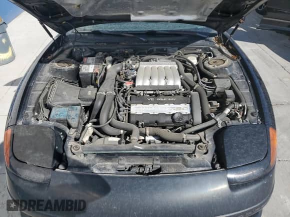 1991 Dodge Stealth with VIN JB3XE74C5MY012599, listed as a Copart auction lot 68479364 with 125,837 mi miles and Salvage title. Bid and sale history available at DreamBid. Image 11.