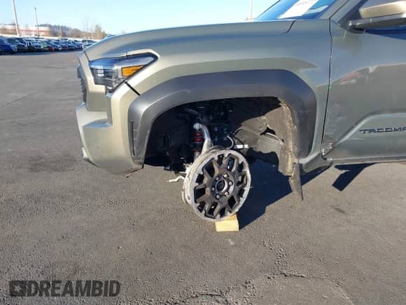 2024 Toyota Tacoma SR5 with VIN 3TMLB5JN6RM048448, listed as a IAAI auction lot 41005722 with 1,562 mi miles and . Bid and sale history available at DreamBid. Image 6.