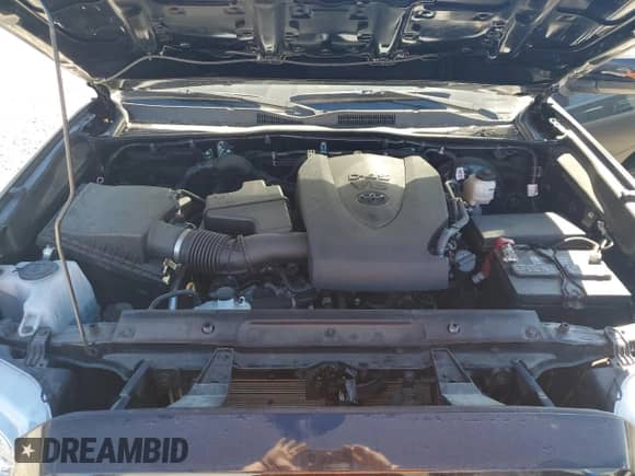 2023 Toyota Tacoma SR z VIN 3TYRZ5CN5PT029152, wystawiony jako Copart lot #86604595 z przebiegiem 22 478 mil mil oraz Szkoda całkowita • Salvage title. Historia ofert i sprzedaży dostępna na DreamBid. Obrazek 11.