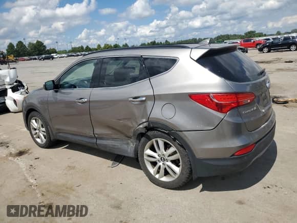 2016 Hyundai Santa Fe с VIN 5XYZW4LA2GG306509, выставлен на аукционе Copart как лот 70261325 с пробегом 131 880 миль миль и Списание • Salvage title. История ставок и продаж доступна на DreamBid. Изображение 2.