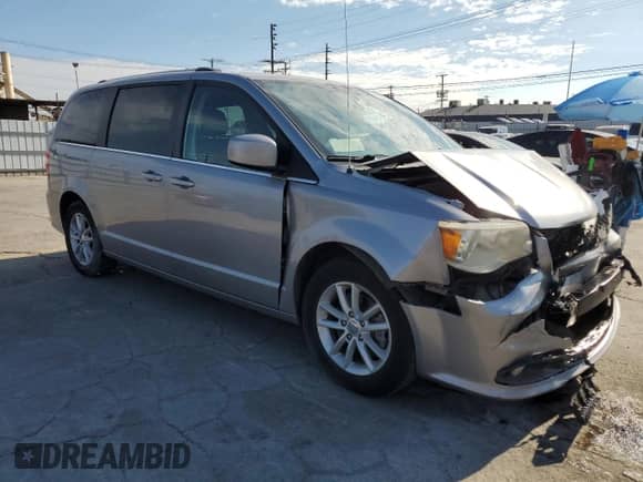 2018 Dodge Grand Caravan SXT with VIN 2C4RDGCG3JR205431, listed as a Copart auction lot 81589715 with 135,490 mi miles and Salvage title. Bid and sale history available at DreamBid. Image 4.