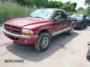 2000 Dodge Dakota Sport with VIN 1B7GG22N4YS732002, listed as a IAAI auction lot 42389415 with 138,944 mi miles and . Bid and sale history available at DreamBid. Image 2.