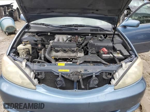 2002 Toyota Camry LE с VIN 4T1BF30K02U535945, выставлен на аукционе Copart как лот 85179885 с пробегом 189 173 миль миль и Списание • Salvage title. История ставок и продаж доступна на DreamBid. Изображение 11.