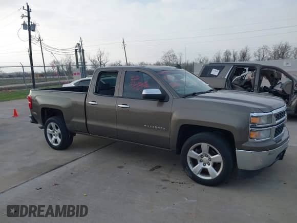 2015 Chevrolet Silverado 1500 LS with VIN 1GCRCPEH7FZ317736, listed as a IAAI auction lot 41788598 with 153,629 mi miles and . Bid and sale history available at DreamBid. Image 13.